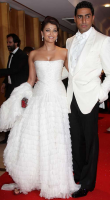 Aishwarya Rai  and husband in glamorours gown and tuxeto.PNG